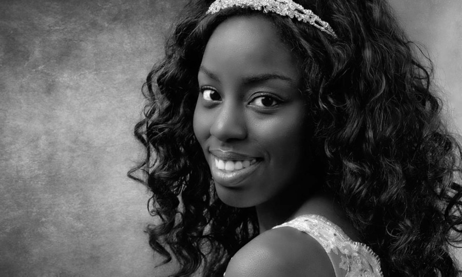 A black and white studio portrait created by Isabelle Guillen in