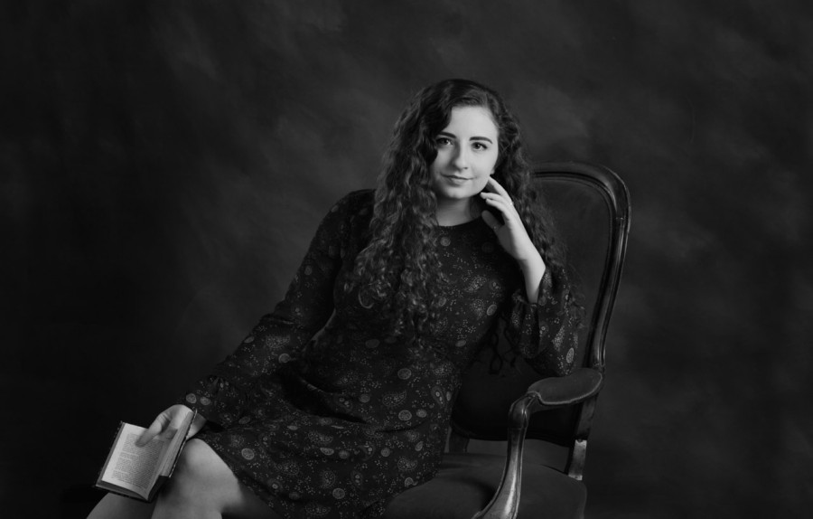 A black and white studio portrait created by Isabelle Guillen in