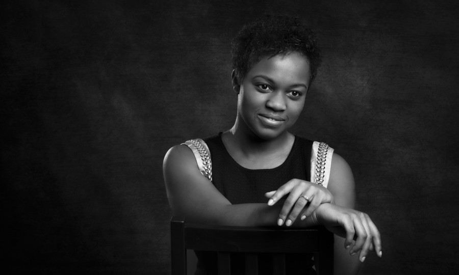 A black and white studio portrait created by Isabelle Guillen in